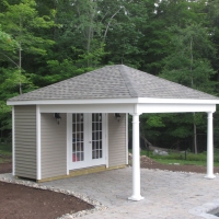 14 x 16 Avalon with options seen hip roof, 15 lite pre hung doors, 2 8" round columns, porch, finished porch ceiling