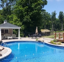 12x20 Avalon with vinyl siding, weather vane, cupola, 12 lite hinged windows, serving counter