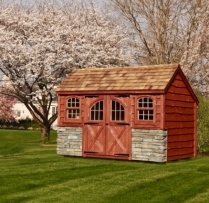 8x12 Garden Shed with Heritage Siding, Cedar Shake Roof, Heritage Siding, Dry Ledge Stone Front, Rustic Cedar Stain, Carriage Doors, Arch Top Windows