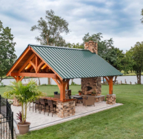 18x20 Kingston Pro Timber Frame Pavilion - 18x20 Kingston Pro Timber Frame Pavilion, bar seating view, with lake in backyard