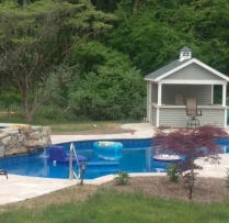 10 x 14 Siesta with vinyl siding, U shaped bar, 21" shed coupola with black top and windows