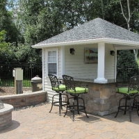 10x10 Siesta with vinyl siding , stone bar fac