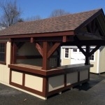 12 x 16 Siesta with t-1-11 siding with Timberframe front, tile bar top with royal trim on bar front