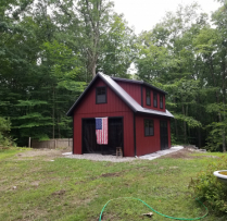 14x24 12 Pitch 2 Story Patriot 9' Garage Door Vented Soffit Upgrade Bottom 2 windows to 30x36 with trim Transom in Double Door Metal Roof 16' Long House Dormer