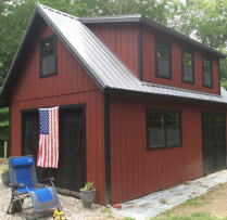 14x24 12 Pitch 2 Story Patriot 9' Garage Door Vented Soffit Upgrade Bottom 2 windows to 30x36 with trim Transom in Double Door Metal Roof 16' Long House Dormer